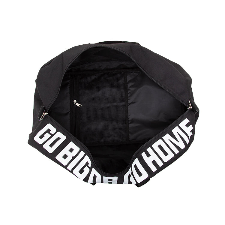Black bag with 'GO BIG OR GO HOME' strap on a white background