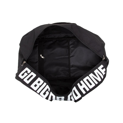 Black bag with 'GO BIG OR GO HOME' strap on a white background
